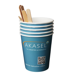 Akasel Cold Mounting Mixing Kit – Cups Stacked: Stack of turquoise mixing cups displaying the Akasel logo and the slogan "The Smarter Alternative" on the front. A QR code with the text "Scan for instruction videos" is prominently displayed. Multiple wooden sticks extend from the top cup. Specially designed for metallographic cold mounting processes, compatible with all cold mounting materials.