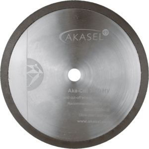 Akasel diamond cut-off wheel Aka-Cut 3000 HV, 150 mm, crafted from silver metal with a dark rim. The disc displays text such as "Aka-Cut 3000 HV", "Diamond cut-off wheel, resin bond", "Recommended: 2700 rpm", "Batch: C2024420", and the website address "www.akasel.com". A central hole allows for mounting.