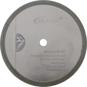 Akasel diamond cut-off wheel Aka-Cut 50 HV, 150 mm, with a glossy silver finish and a gray outer rim. The disc displays inscriptions such as "Aka-Cut 50 HV", "Electroplated diamond cut-off wheel", "Recommended: 2700 rpm", "Batch: C202453", "Store clean and dry", and the website address "www.akasel.com". A central hole is included for mounting.
